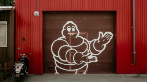 Michelin Man graffiti on red industrial building in Seoul, Korea.