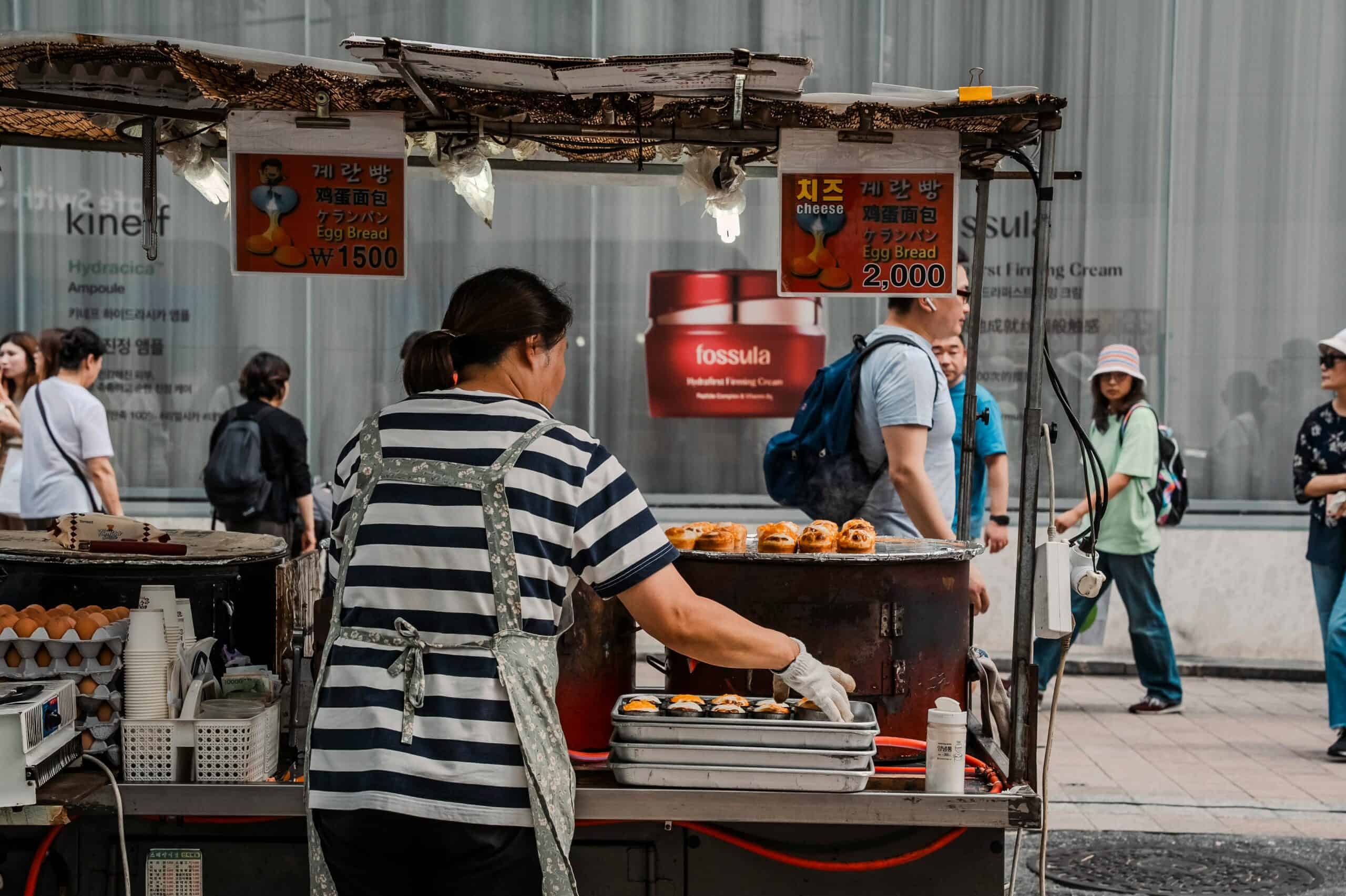 Street food stall in Seoul serving traditional Korean snacks and treats.